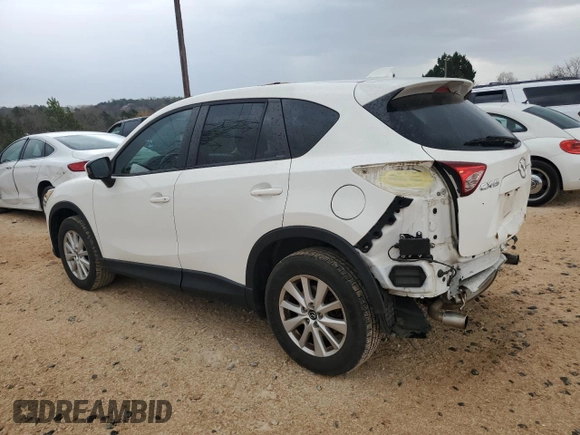2014 Mazda CX-5 Touring with VIN JM3KE2CY1E0379158, listed as a Copart auction lot 50085935 with 90,340 mi miles and Salvage Title. Bid and sale history available at carsss.com. Image 2.