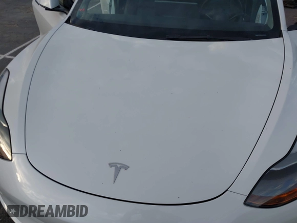 2022 Tesla Model 3 with VIN 5YJ3E1EA9NF375335, listed as a IAAI auction lot 41676024 with 18,836 mi miles. Bid and sale history available at carsss.com. Image 10.