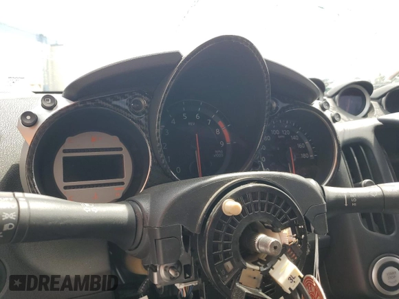 2012 Nissan 370Z z VIN JN1AZ4EH1CM562134, wystawiony jako Copart lot #56708065 z przebiegiem Nie podano mil oraz Szkoda całkowita • Salvage title. Historia ofert i sprzedaży dostępna na DreamBid. Obrazek 9.