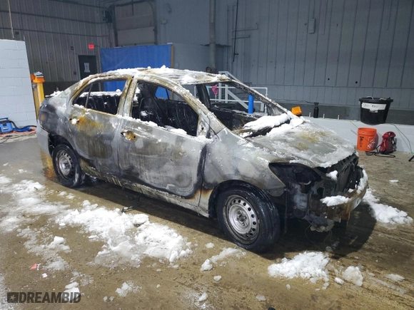 2010 Toyota Yaris with VIN JTDBT4K30A1371394, listed as a Copart auction lot 84267804 with 0 mi miles and Salvage Title. Bid and sale history available at carsss.com. Image 4.