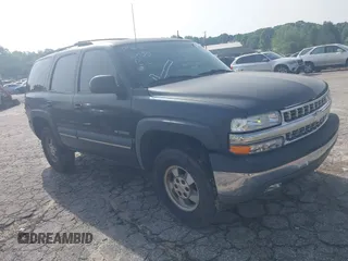 2002 Chevrolet Tahoe LS z VIN 1GNEC13ZX2R273935, wystawiony jako IAAI lot #42246472 z przebiegiem 205 995 mil mil oraz . Historia ofert i sprzedaży dostępna na DreamBid. Obrazek 1.