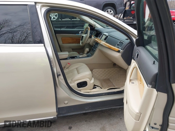 2010 Lincoln MKS с VIN 1LNHL9DR0AG607074, выставлен на аукционе IAAI как лот 41900627 с пробегом 118 882 миль миль и . История ставок и продаж доступна на DreamBid. Изображение 5.