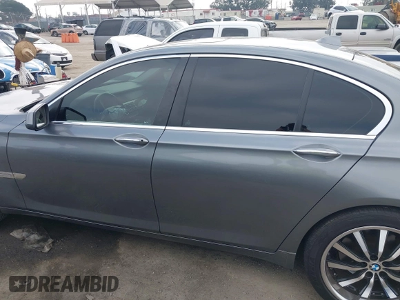 2012 BMW 7 Series 740i with VIN WBAKA4C52CC613676, listed as a IAAI auction lot 42509312 with 113,971 mi miles and . Bid and sale history available at DreamBid. Image 14.