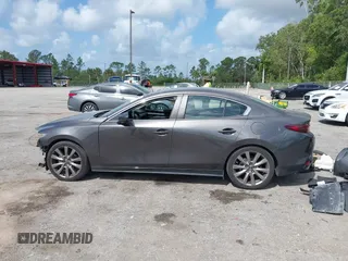 2020 Mazda 3 Select z VIN 3MZBPACL9LM127098, wystawiony jako IAAI lot #41948541 z przebiegiem 67 431 mil mil oraz . Historia ofert i sprzedaży dostępna na DreamBid. Obrazek 14.