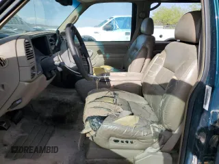 1997 GMC Suburban z VIN 3GKGK26J0VG522963, wystawiony jako Copart lot #56804105 z przebiegiem 297 544 mil mil oraz Tytuł czysty. Historia ofert i sprzedaży dostępna na DreamBid. Obrazek 7.