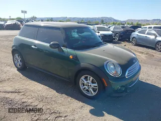 2011 MINI Hardtop with VIN WMWSU3C53BT096033, listed as a IAAI auction lot 42099895 with 97,739 mi miles and . Bid and sale history available at DreamBid. Image 1.