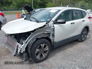 2018 Honda CR-V LX with VIN 2HKRW5H36JH409111, listed as a IAAI auction lot 42133939 with 105,511 mi miles and . Bid and sale history available at DreamBid. Image 19.