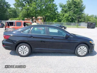 2019 Volkswagen Jetta S z VIN 3VWC57BU6KM084104, wystawiony jako IAAI lot #42423409 z przebiegiem 115 398 mil mil oraz . Historia ofert i sprzedaży dostępna na DreamBid. Obrazek 13.