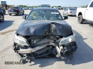 2016 BMW 2 Series M235i xDrive with VIN WBA1J9C55GV372098, listed as a Copart auction lot 58088723 with 84,995 mi miles. Bid and sale history available at carsss.com. Image 5.