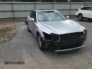 2014 Infiniti Q50 Premium with VIN JN1BV7AP4EM671611, listed as a Copart auction lot 63698505 with 134,904 mi miles and Salvage title. Bid and sale history available at DreamBid. Image 14.