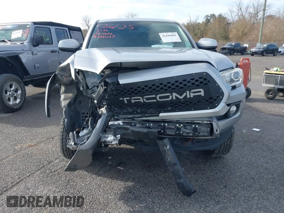 2018 Toyota Tacoma SR5 with VIN 5TFAZ5CN6JX057889, listed as a IAAI auction lot 41449604 with 114,888 mi miles and . Bid and sale history available at DreamBid. Image 6.