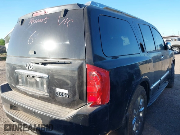 2009 Infiniti QX56 with VIN 5N3AA08D69N904172, listed as a IAAI auction lot 41756378 with 209,031 mi miles. Bid and sale history available at carsss.com. Image 4.