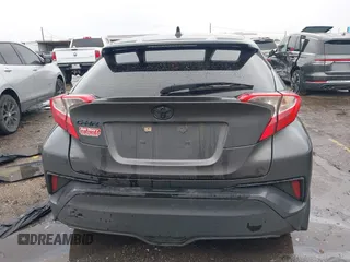 2021 Toyota C-HR LE with VIN JTNKHMBX0M1129080, listed as a IAAI auction lot 41321604 with 52,916 mi miles. Bid and sale history available at carsss.com. Image 16.