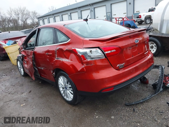 2018 Ford Focus Titanium with VIN 1FADP3J20JL280698, listed as a IAAI auction lot 41823530 with 54,841 mi miles and . Bid and sale history available at DreamBid. Image 3.