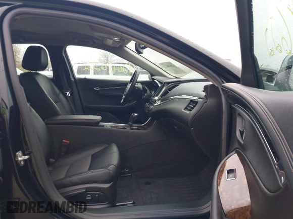 2015 Chevrolet Impala LT with VIN 2G1125S32F9228303, listed as a IAAI auction lot 42018622 with 64,836 mi miles and . Bid and sale history available at DreamBid. Image 5.