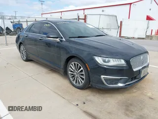 2017 Lincoln MKZ Select z VIN 3LN6L5D95HR633026, wystawiony jako IAAI lot #41982952 z przebiegiem 210 928 mil mil oraz . Historia ofert i sprzedaży dostępna na DreamBid. Obrazek 1.