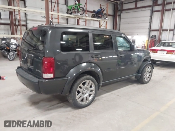 2010 Dodge Nitro Heat with VIN 1D4PT4GK4AW173980, listed as a IAAI auction lot 41842870 with 165,087 mi miles and . Bid and sale history available at DreamBid. Image 4.