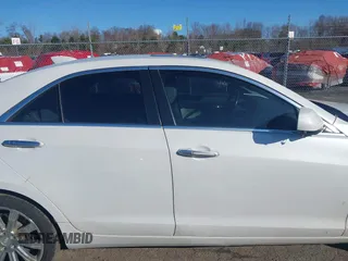 2016 Cadillac ATS Sedan Luxury Collection AWD with VIN 1G6AH5SX5G0106431, listed as a IAAI auction lot 41844622 with 124,759 mi miles. Bid and sale history available at carsss.com. Image 14.