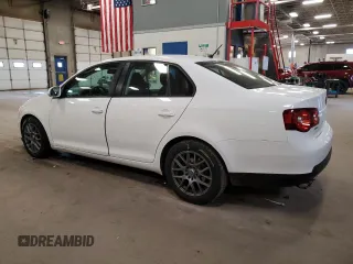 2010 Volkswagen Jetta S with VIN 3VWJZ7AJ5AM004163, listed as a Copart auction lot 54312695 with 148,160 mi miles and Salvage title. Bid and sale history available at DreamBid. Image 2.