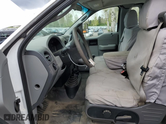 2005 Ford F-150 XL with VIN 1FTRF14W25NA51777, listed as a Copart auction lot 52041495 with 178,440 mi miles and Salvage title. Bid and sale history available at DreamBid. Image 7.