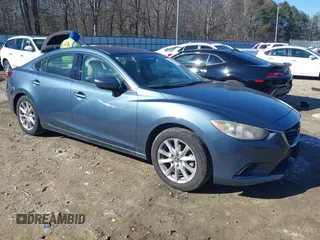 2015 Mazda 6 i Sport with VIN JM1GJ1U54F1196647, listed as a IAAI auction lot 41286544 with 133,654 mi miles. Bid and sale history available at carsss.com. Image 1.