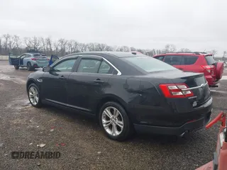 2013 Ford Taurus SEL with VIN 1FAHP2E83DG107913, listed as a IAAI auction lot 42007575 with 147,240 mi miles. Bid and sale history available at carsss.com. Image 3.