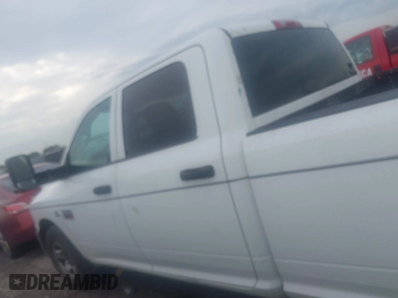 2012 Ram 2500 ST z VIN 3C6TD4HL7CG265349, wystawiony jako IAAI lot #42479271 z przebiegiem 301 419 mil mil oraz . Historia ofert i sprzedaży dostępna na DreamBid. Obrazek 14.