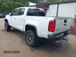 2019 Chevrolet Colorado 4WD ZR2 z VIN 1GCPTEE13K1166594, wystawiony jako IAAI lot #42374128 z przebiegiem 127 889 mil mil oraz . Historia ofert i sprzedaży dostępna na DreamBid. Obrazek 3.