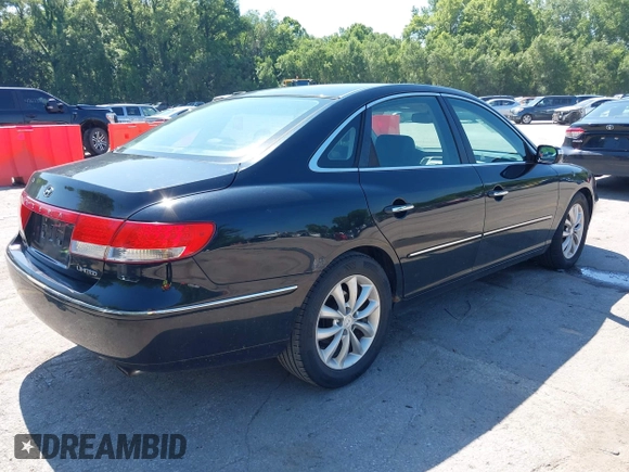 2007 Hyundai Azera SE with VIN KMHFC46F47A172875, listed as a IAAI auction lot 42632253 with 218,536 mi miles and . Bid and sale history available at DreamBid. Image 4.