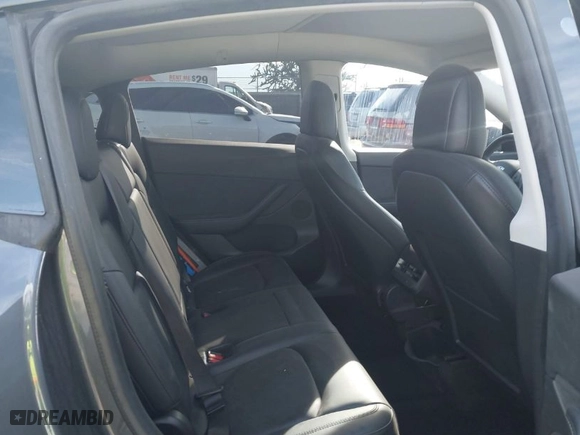 2021 Tesla Model Y Long Range with VIN 5YJYGDEE7MF149037, listed as a IAAI auction lot 41252869 with NaN miles. Bid and sale history available at carsss.com. Image 8.