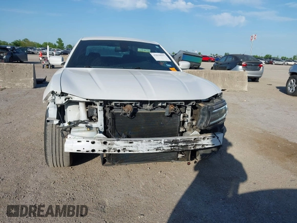 2015 Dodge Charger SXT with VIN 2C3CDXHG8FH730145, listed as a IAAI auction lot 42039927 with 156,135 mi miles and . Bid and sale history available at DreamBid. Image 6.