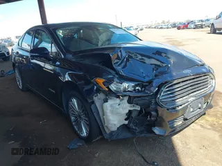 2014 Ford Fusion SE Hybrid with VIN 3FA6P0LUXER291754, listed as a IAAI auction lot 42415936 with 154,474 mi miles and . Bid and sale history available at DreamBid. Image 1.