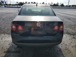 2010 Volkswagen Jetta Limited Edition z VIN 3VWAX7AJ7AM157665, wystawiony jako Copart lot #57994085 z przebiegiem 115 108 mil mil oraz Szkoda całkowita • Salvage title. Historia ofert i sprzedaży dostępna na DreamBid. Obrazek 6.