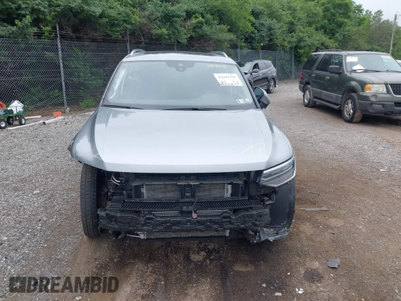 2022 Volkswagen Tiguan SE z VIN 3VV2B7AX0NM159615, wystawiony jako IAAI lot #42399370 z przebiegiem 25 352 mil mil oraz . Historia ofert i sprzedaży dostępna na DreamBid. Obrazek 12.