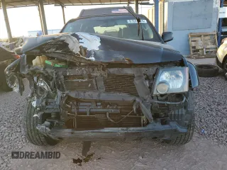 2012 Nissan Xterra X with VIN 5N1AN0NUXCC521582, listed as a Copart auction lot 87224574 with 177,458 mi miles and Salvage title. Bid and sale history available at DreamBid. Image 5.