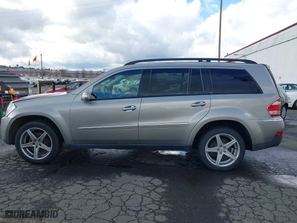 2007 Mercedes-Benz GL-Class with VIN 4JGBF71E17A132064, listed as a IAAI auction lot 41712672 with 129,744 mi miles. Bid and sale history available at carsss.com. Image 14.
