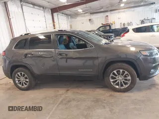 2021 Jeep Cherokee Latitude Lux z VIN 1C4PJMMX5MD194128, wystawiony jako IAAI lot #42257671 z przebiegiem 25 969 mil mil oraz . Historia ofert i sprzedaży dostępna na DreamBid. Obrazek 13.