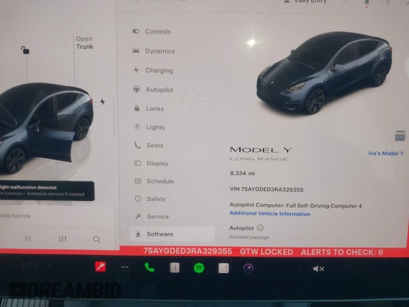 2024 Tesla Model Y with VIN 7SAYGDED3RA329355, listed as a IAAI auction lot 42343269 with 8,334 mi miles and . Bid and sale history available at DreamBid. Image 7.