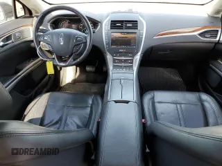 2014 Lincoln MKZ z VIN 3LN6L2GK0ER800286, wystawiony jako Copart lot #57644645 z przebiegiem 130 880 mil mil oraz Szkoda całkowita • Salvage title. Historia ofert i sprzedaży dostępna na DreamBid. Obrazek 8.