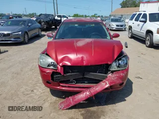 2006 Nissan Altima S z VIN 1N4AL11D06N423536, wystawiony jako IAAI lot #42279390 z przebiegiem 150 308 mil mil oraz . Historia ofert i sprzedaży dostępna na DreamBid. Obrazek 12.