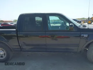 2003 Ford F-150 XLT with VIN 1FTRW07L53KC01651, listed as a IAAI auction lot 41827007 with 233,842 mi miles and . Bid and sale history available at DreamBid. Image 13.