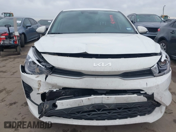 2023 Kia Rio S z VIN 3KPA24AD3PE542301, wystawiony jako IAAI lot #41364553 z przebiegiem 35 204 mil mil oraz . Historia ofert i sprzedaży dostępna na DreamBid. Obrazek 6.
