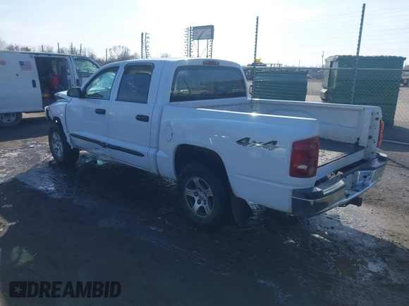 2005 Dodge Dakota SLT with VIN 1D7HW48N85S226460, listed as a IAAI auction lot 41568128 with 213,159 mi miles and . Bid and sale history available at carsss.com. Image 3.
