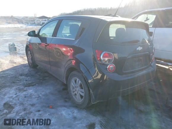 2013 Chevrolet Sonic LT with VIN 1G1JC6SB2D4256838, listed as a IAAI auction lot 41443769 with 98,839 mi miles. Bid and sale history available at carsss.com. Image 3.