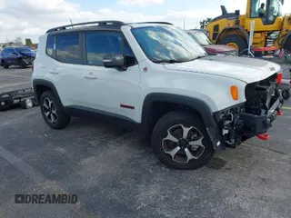 2021 Jeep Renegade Trailhawk with VIN ZACNJDC1XMPN28463, listed as a IAAI auction lot 41265800 with 13,395 mi miles and . Bid and sale history available at DreamBid. Image 1.