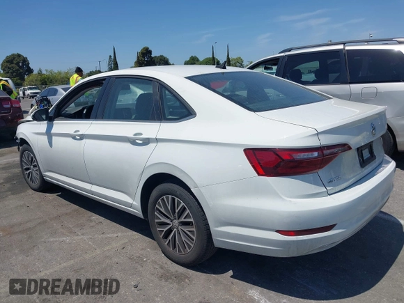 2021 Volkswagen Jetta S z VIN 3VWC57BU4MM037088, wystawiony jako IAAI lot #42087111 z przebiegiem 82 728 mil mil oraz . Historia ofert i sprzedaży dostępna na DreamBid. Obrazek 14.