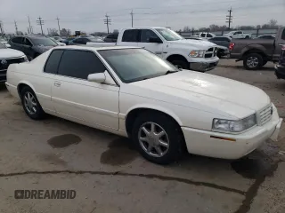 2001 Cadillac Eldorado Touring ETC z VIN 1G6ET12921B103685, wystawiony jako Copart lot #84565144 z przebiegiem 99 265 mil mil oraz Szkoda całkowita • Salvage title. Historia ofert i sprzedaży dostępna na DreamBid. Obrazek 4.