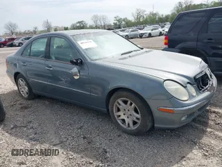 2005 Mercedes-Benz E-Class 3.2L CDI with VIN WDBUF26J75A556690, listed as a IAAI auction lot 40146146 with 1 mi miles. Bid and sale history available at carsss.com. Image 1.
