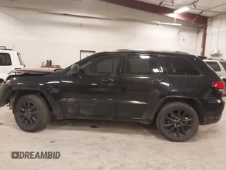 2018 Jeep Grand Cherokee Laredo E with VIN 1C4RJFAG5JC417701, listed as a IAAI auction lot 42001159 with 110,767 mi miles and . Bid and sale history available at DreamBid. Image 14.