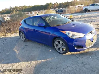 2014 Hyundai Veloster with VIN KMHTC6AD7EU199939, listed as a IAAI auction lot 41289277 with 192,798 mi miles. Bid and sale history available at carsss.com. Image 1.